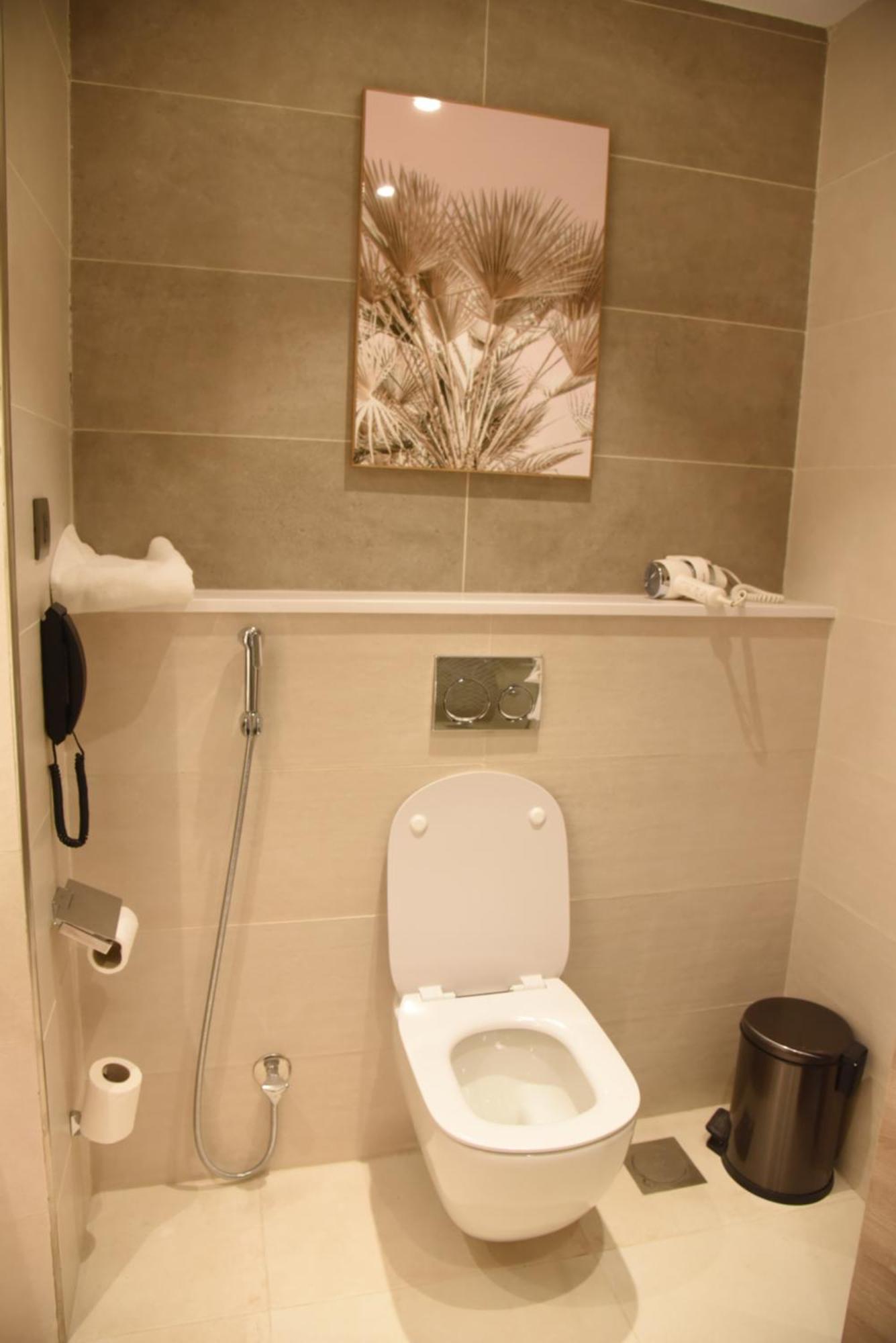Roya Al Andalus Hotel Medina Exterior photo A modern toilet